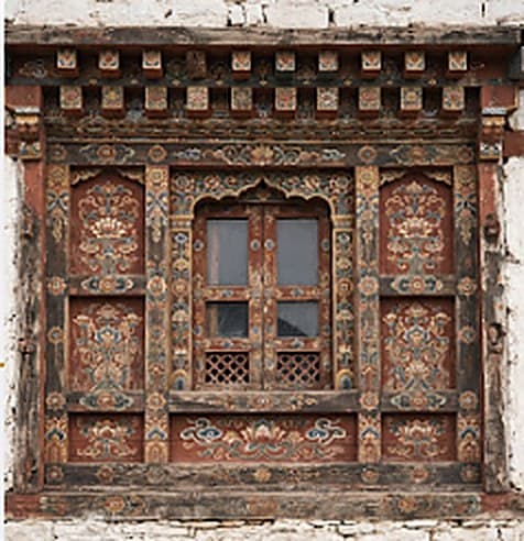 Traditional carved and painted window