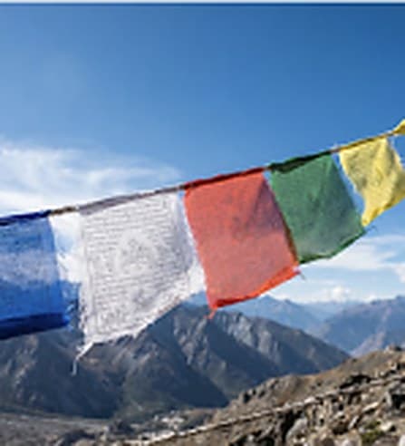 Prayer flags against a Himalayan sky